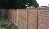 lapped panels & concrete posts & gravel boards