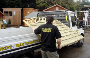 Loading a vehicle for delivery.